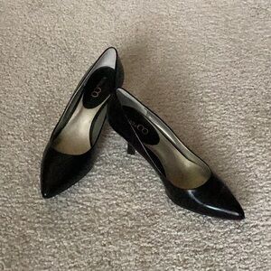 Women black leather heels.